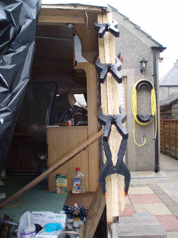 Timber clamped in place